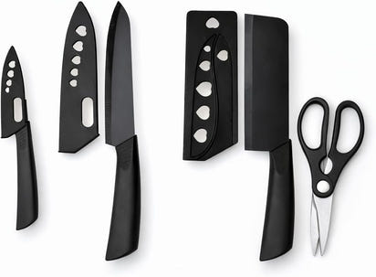 Elegant 4-Piece Stainless Steel Knife Set -Black with Heart Shaped blade covers.
