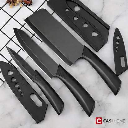 Elegant 4-Piece Stainless Steel Knife Set -Black with Heart Shaped blade covers.