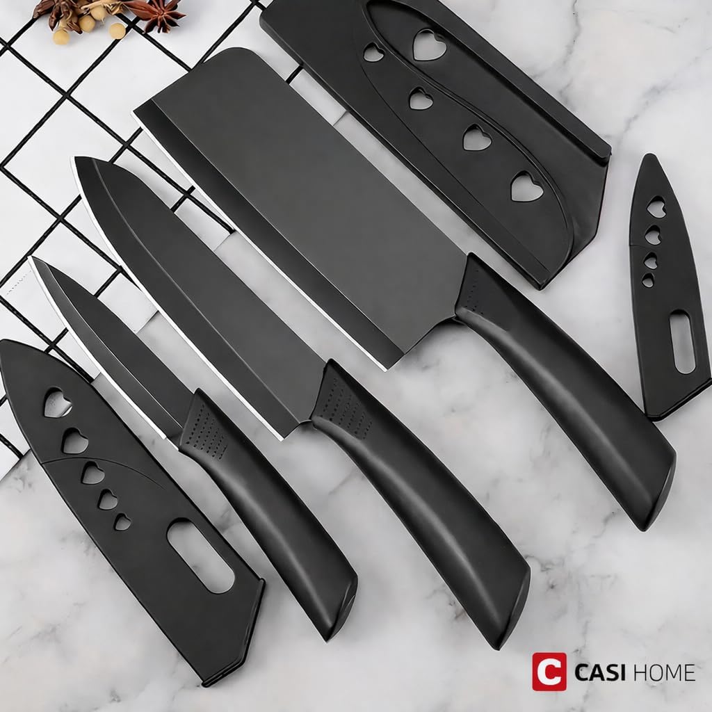 Elegant 4-Piece Stainless Steel Knife Set -Black with Heart Shaped blade covers.