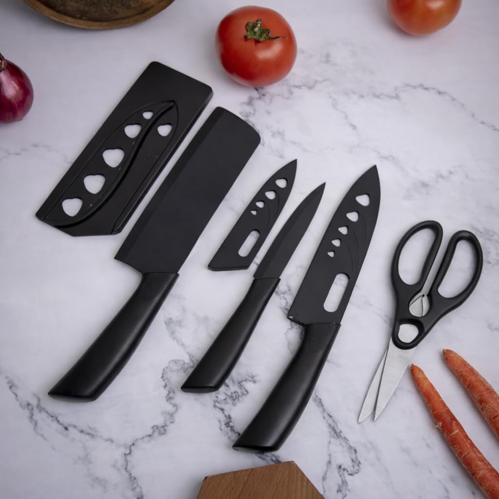 Elegant 4-Piece Stainless Steel Knife Set -Black with Heart Shaped blade covers.