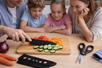 Elegant 4-Piece Stainless Steel Knife Set -Black with Heart Shaped blade covers.