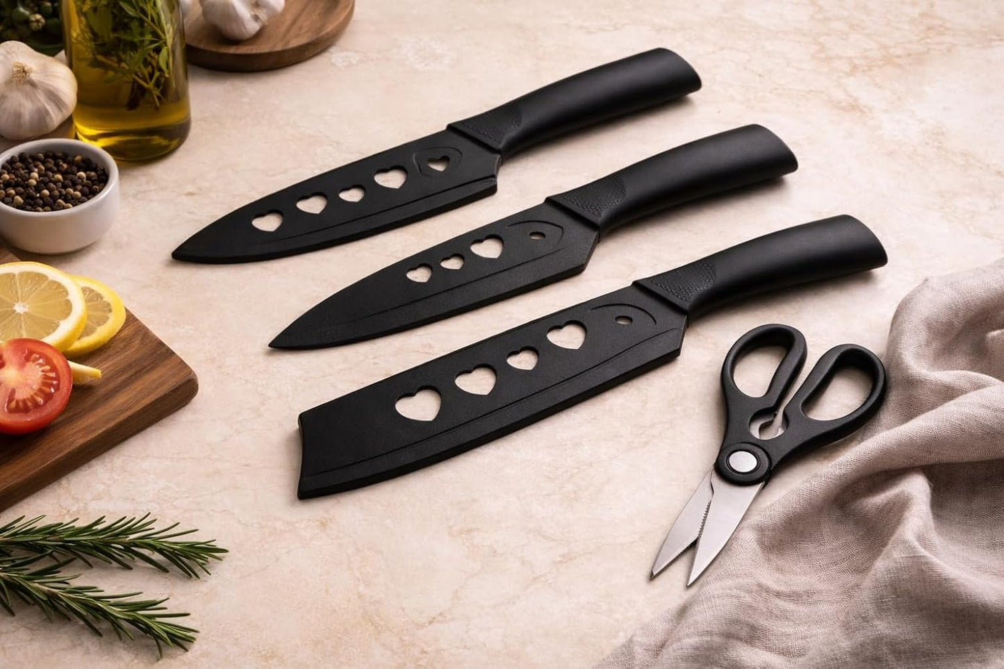 Elegant 4-Piece Stainless Steel Knife Set -Black with Heart Shaped blade covers.