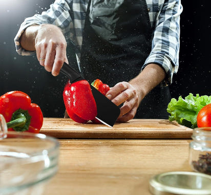 Elegant 4-Piece Stainless Steel Knife Set -Black with Heart Shaped blade covers.